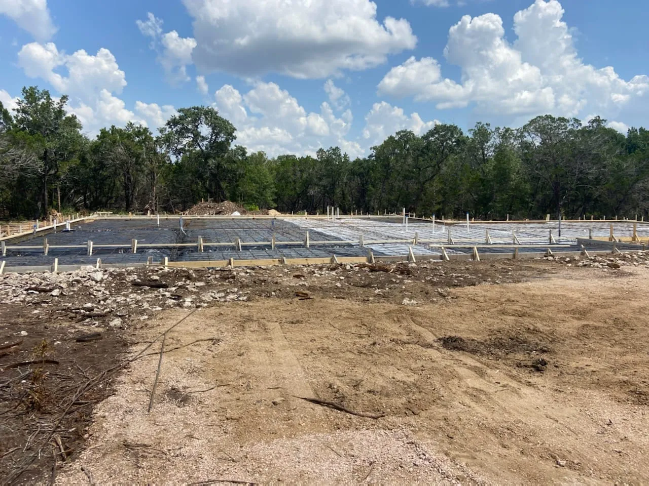 Slab and plumbing rough-in for a new storage facility.
