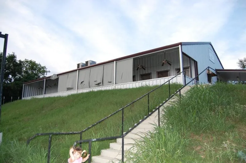 Hillside view of the commercial restaurant building and walkway.